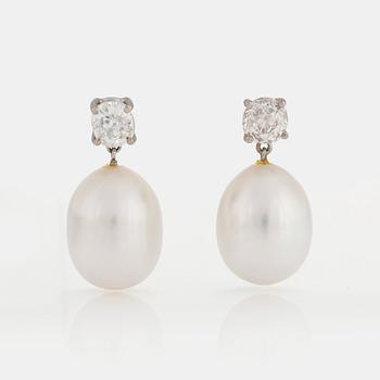 A PAIR OF EARRINGS set with old-cut diamonds.