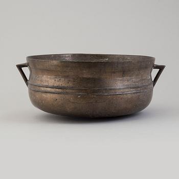 A 19th century bronze pot.