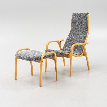 Yngve Ekström, a 'Lamino' armchairs with foot stool, Swedese, Sweden.