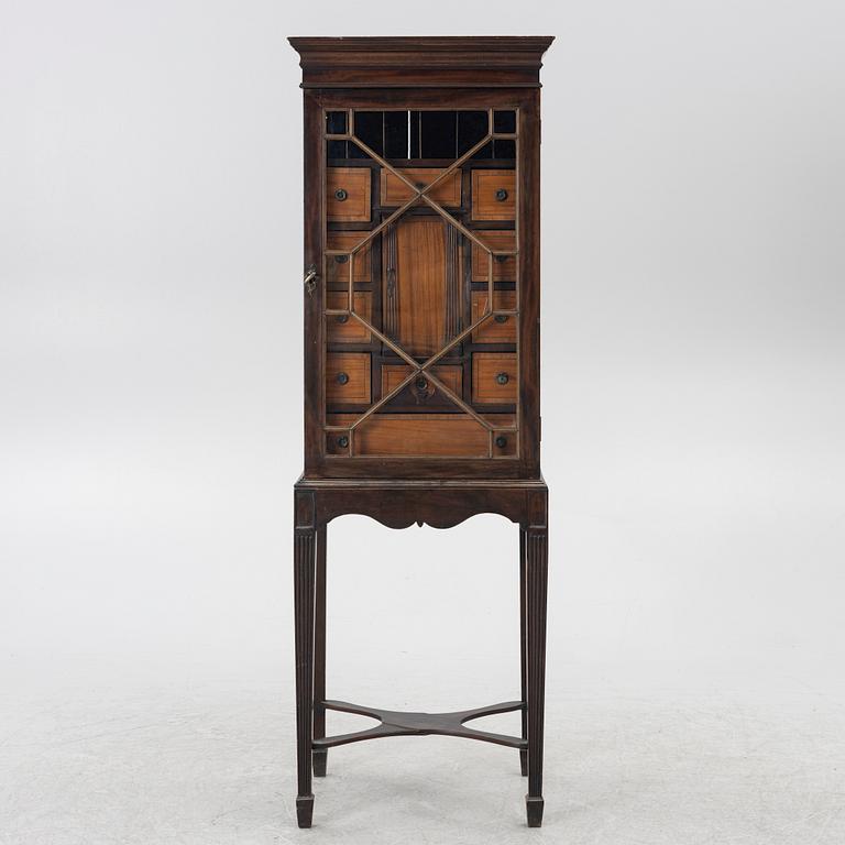 Display cabinet, likely England 19th century.