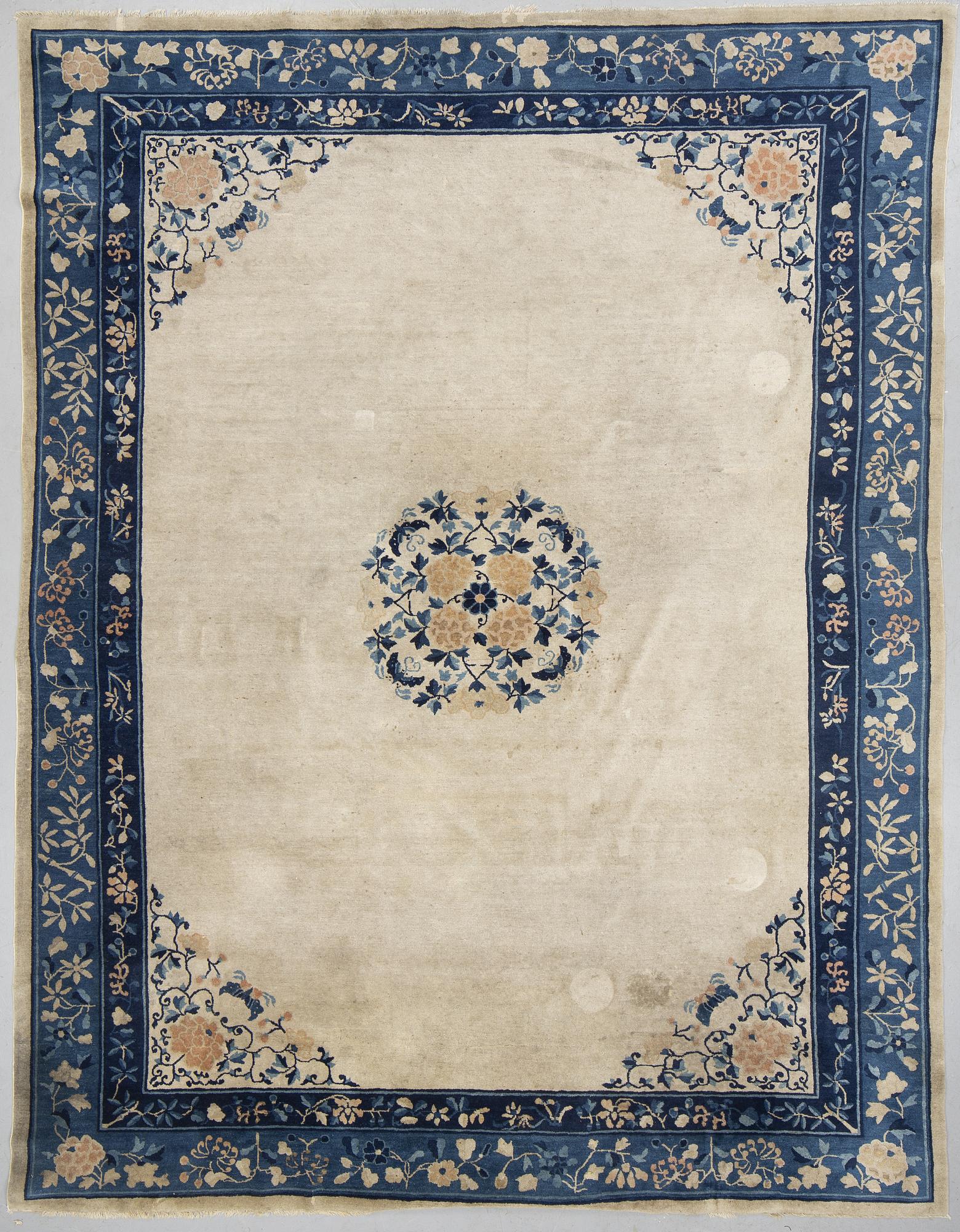 A carpet, an antique Beijing, China, ca 344 x 264 cm.