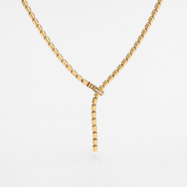 Piaget, An 18K gold "Possession" necklace with diamonds ca. 0.17 ct in total. Marked Piaget D18828.