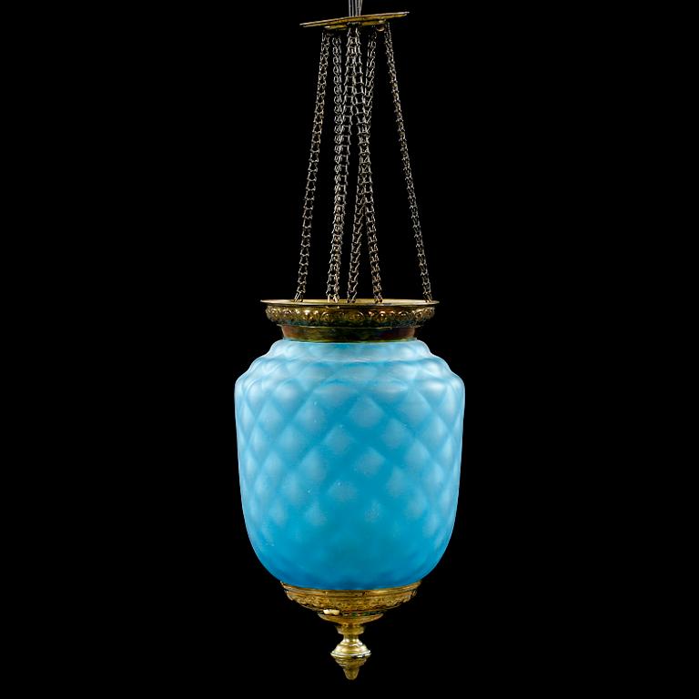 A lantern, made around year 1900. HEight 33 cm excl chains.