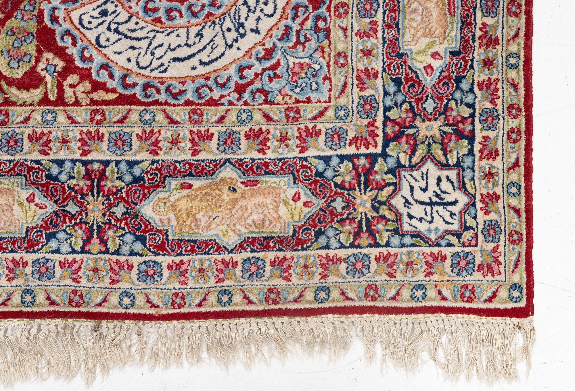 A semi-antique Kirman carpet, c. 275 x 180 cm.