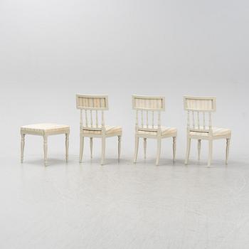 A set of three chairs and a stoolm late Gustavian style from around the year 1900.