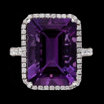 RING, step cut amethyst, 13.48ct, and brilliant cut diamonds, 0.58 cts.