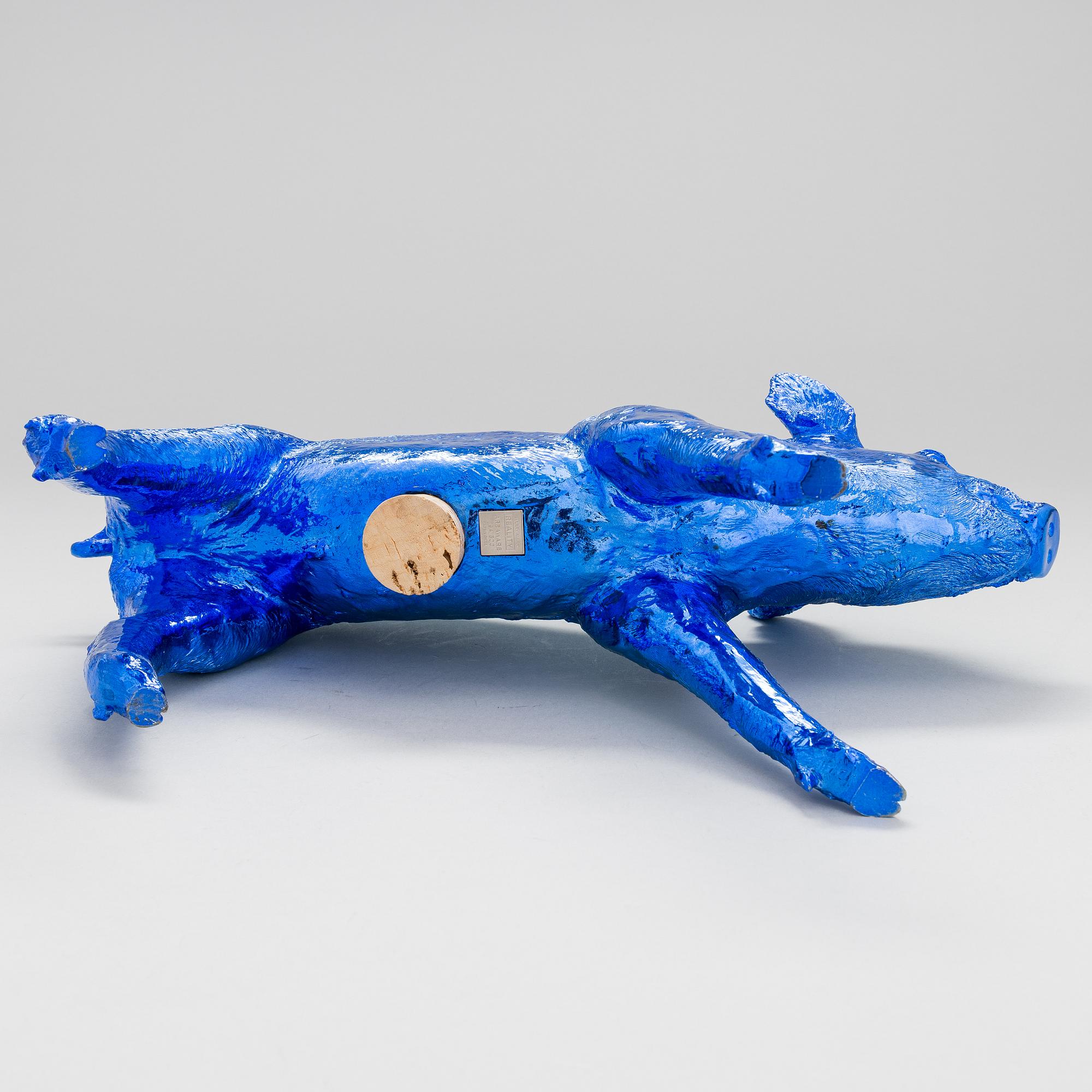 A Piggy bank 'Reality' by Harry Allen, Areaware, 21th century.