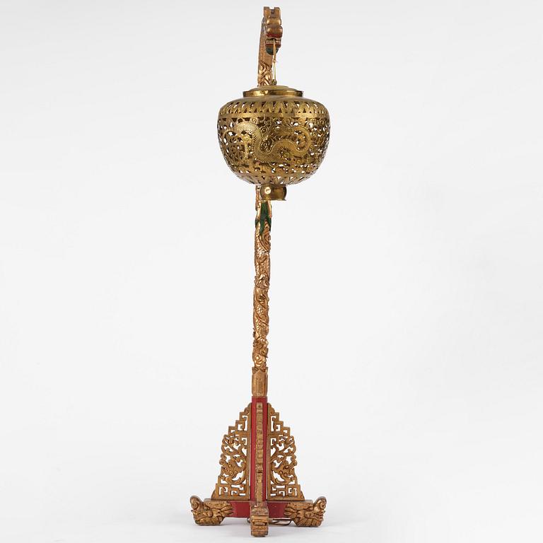 A Chinese gilt wood lantern with brass shade, Qing dynasty, 19th century.