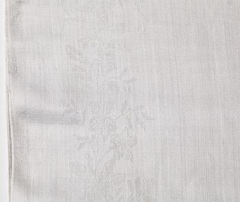 A TABLE CLOTH AND NAPKINS, 24 pieces, linen damask, the table cloth is dated 1827, ca 560-567 x 207,5 cm, Sweden 1827.