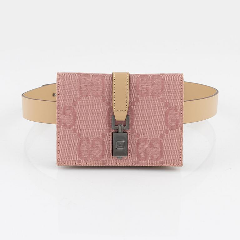 Gucci, a belt with a bag.