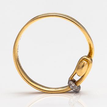 Vivianna Torun Bülow-Hübe, An 18K gold ring "Torun" with diamonds ca. 0.05 ct in total. Georg Jensen, Denmark.