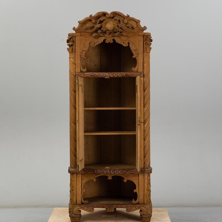 KNUT FJAESTAD, a folk art oak cabinet, signed KF 1935.