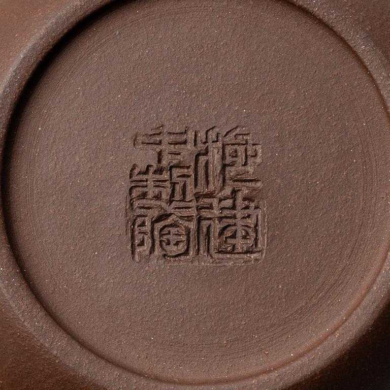 Two yixing teapots, China, 1980s and 2000.