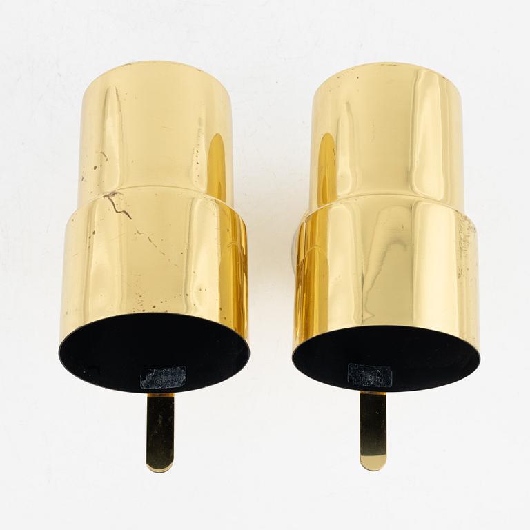 Hans-Agne Jakobsson, a pair of 'Nicke' brass bedside lamps.