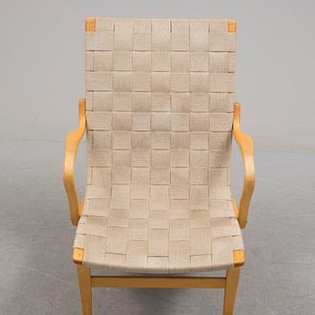 A ' Eva' easy chair by Bruno Mathsson for Firma Karl Mathsson.