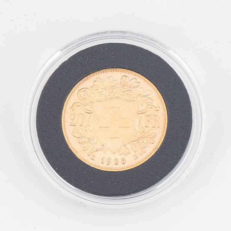 A Swiss gold coin, 20 Franc, 1935.