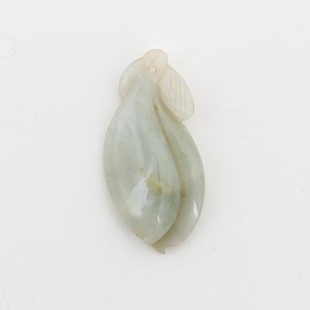 A carved nephrite pendant, China, 20th Century.