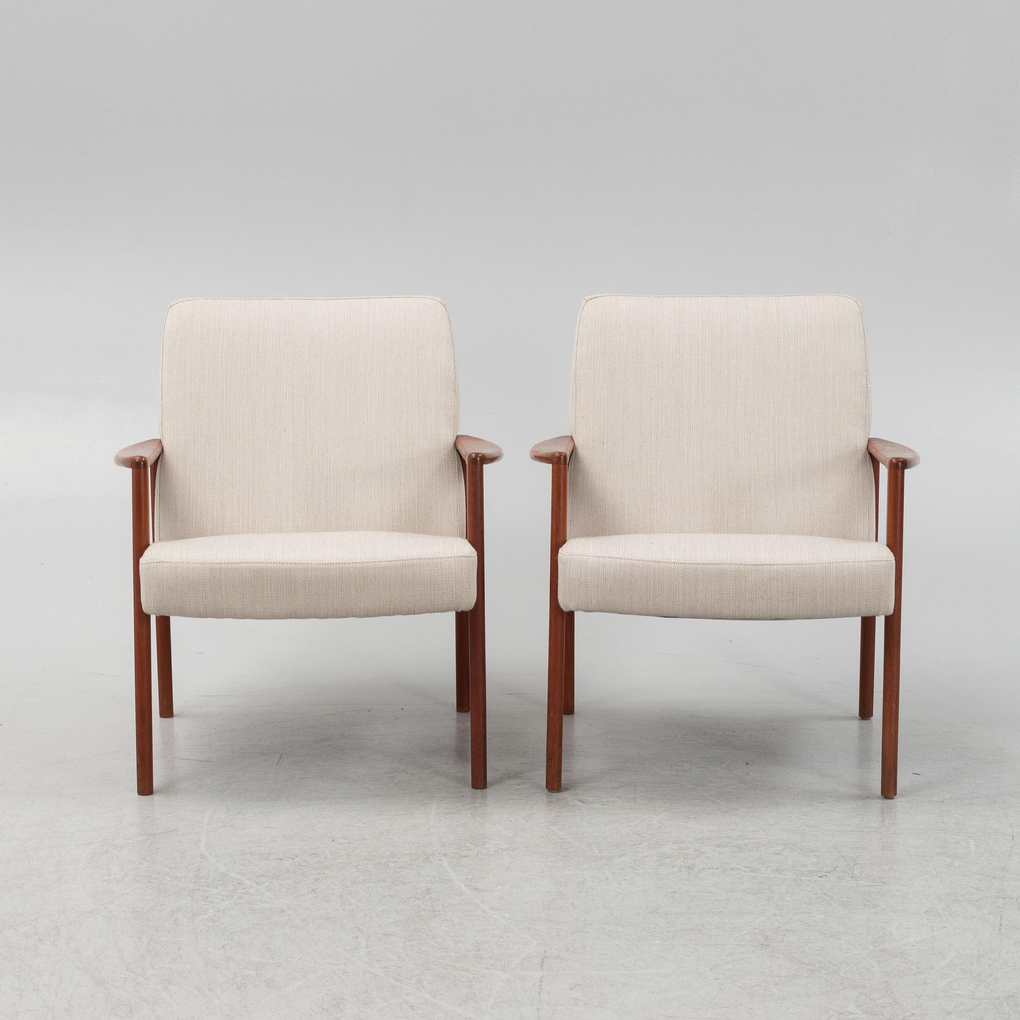 A pair of mid-century easy chairs.