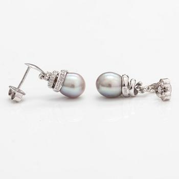 A pair of 14K white gold earrings with cultured pearls and diamonds ca. 0.06 ct in total. Caratia, Helsinki 2001.