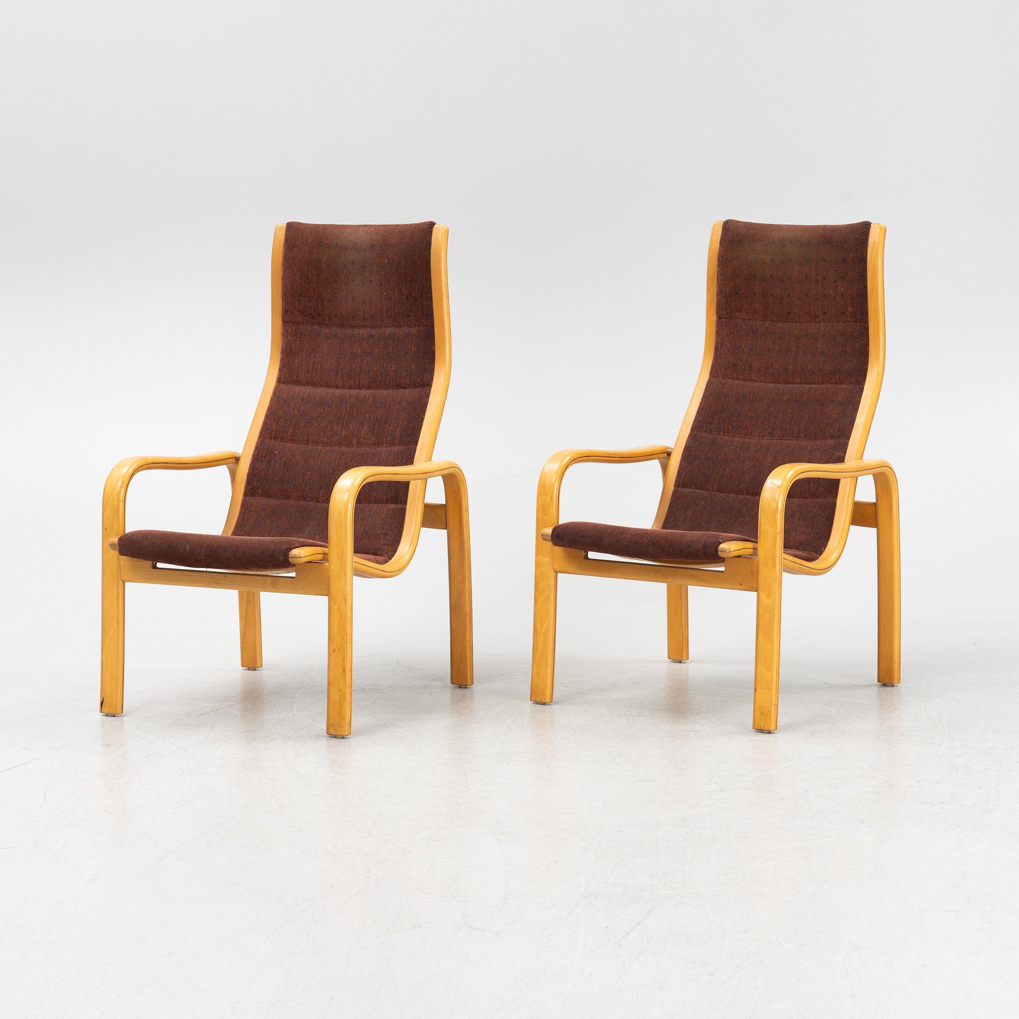 Yngve Ekström, a pair of armchairs, Swedese, late 20th century.