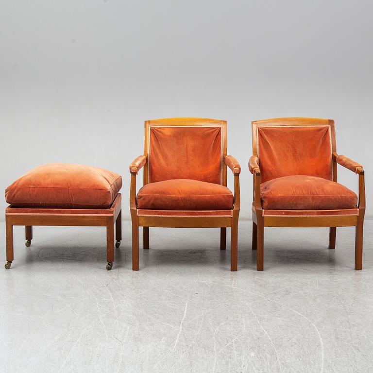 KERSTIN HÖRLIN-HOLMQUIST, a pair of 'Ofelia' armchairs with one foot stool, late 20th Century.