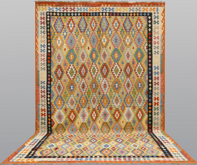 A kilim carpet, ca 486 x 304 cm.