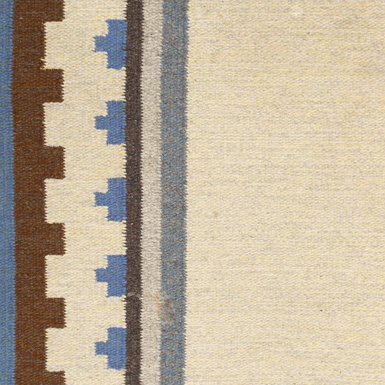 A Swedish flat weave rug, c. 304 x 197 cm.