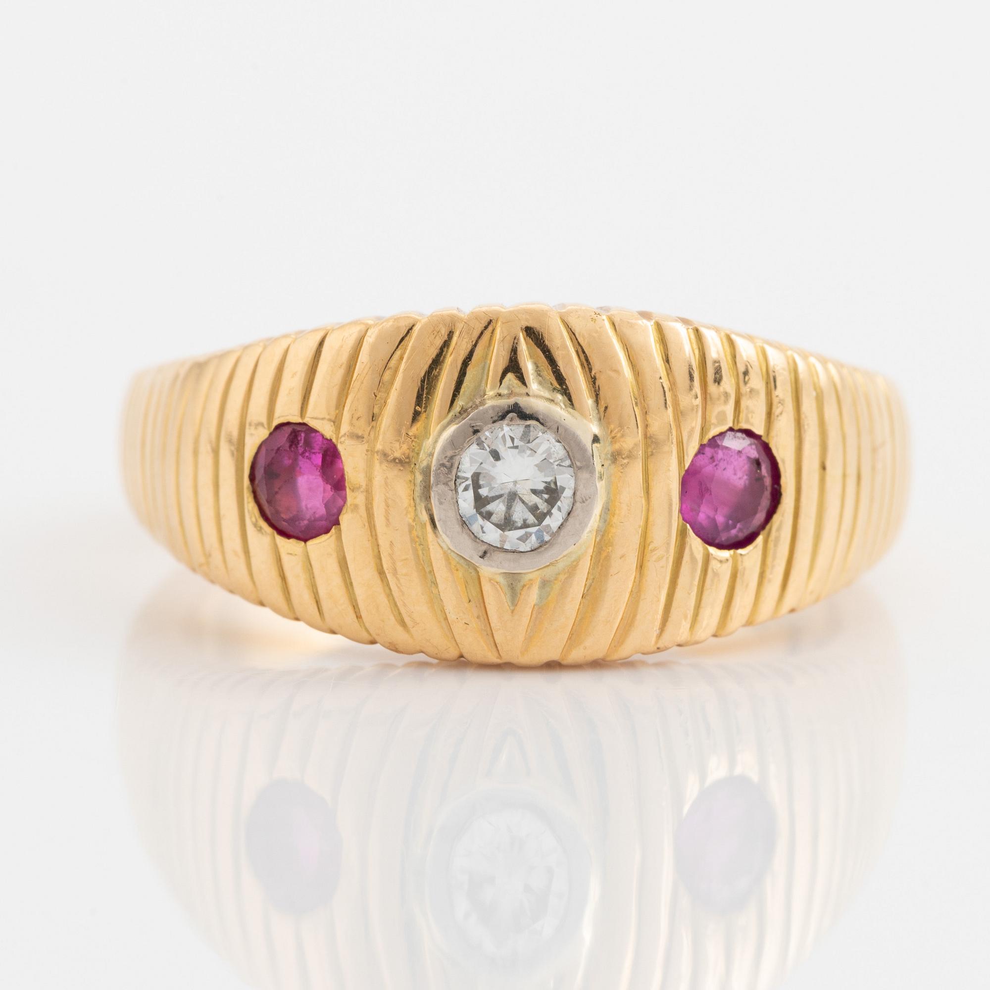 Gold, brilliant cut diamond and ruby ring.