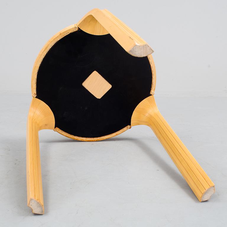 A model X 602 stool by Alvar Aalto.