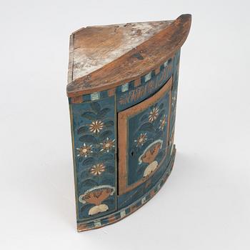 A folk art corner cabinet from Delsbo, Hälsingland dated 1847.