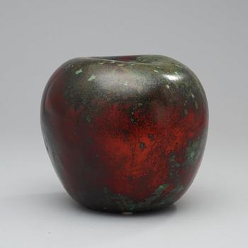 A Hans Hedberg faience apple, Biot, France.