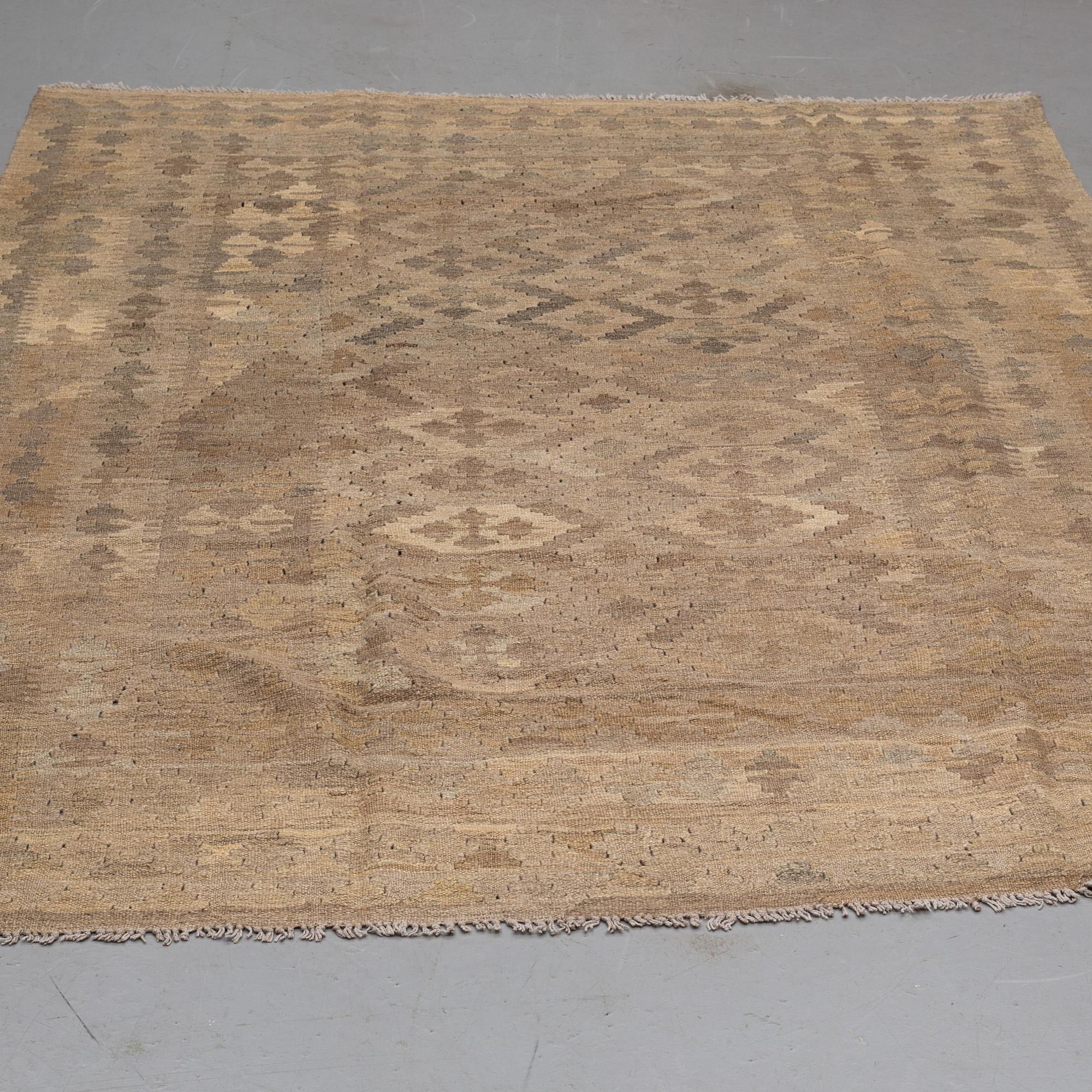 A CARPET, Kilim, ca 239 x 169 cm.
