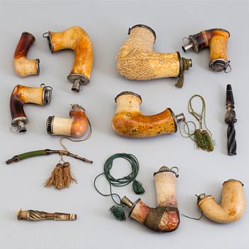 A collection of early20th century pipe heads.