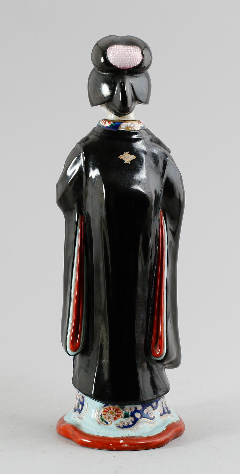 FIGUR, porslin, Japan, omkring år 1900.
