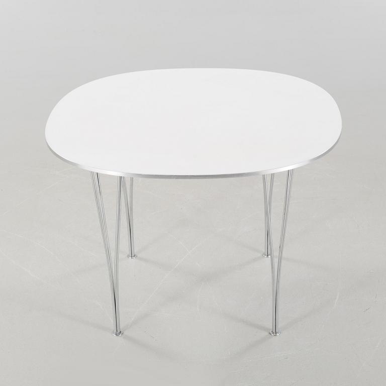 A table by Bruno Mathsson & Piet Hein for Fritz Hansen, model "Supercirkel", dated 1975.