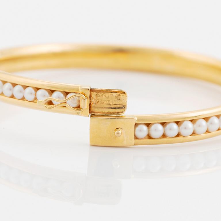 18K gold and pearl bangle, Alton.