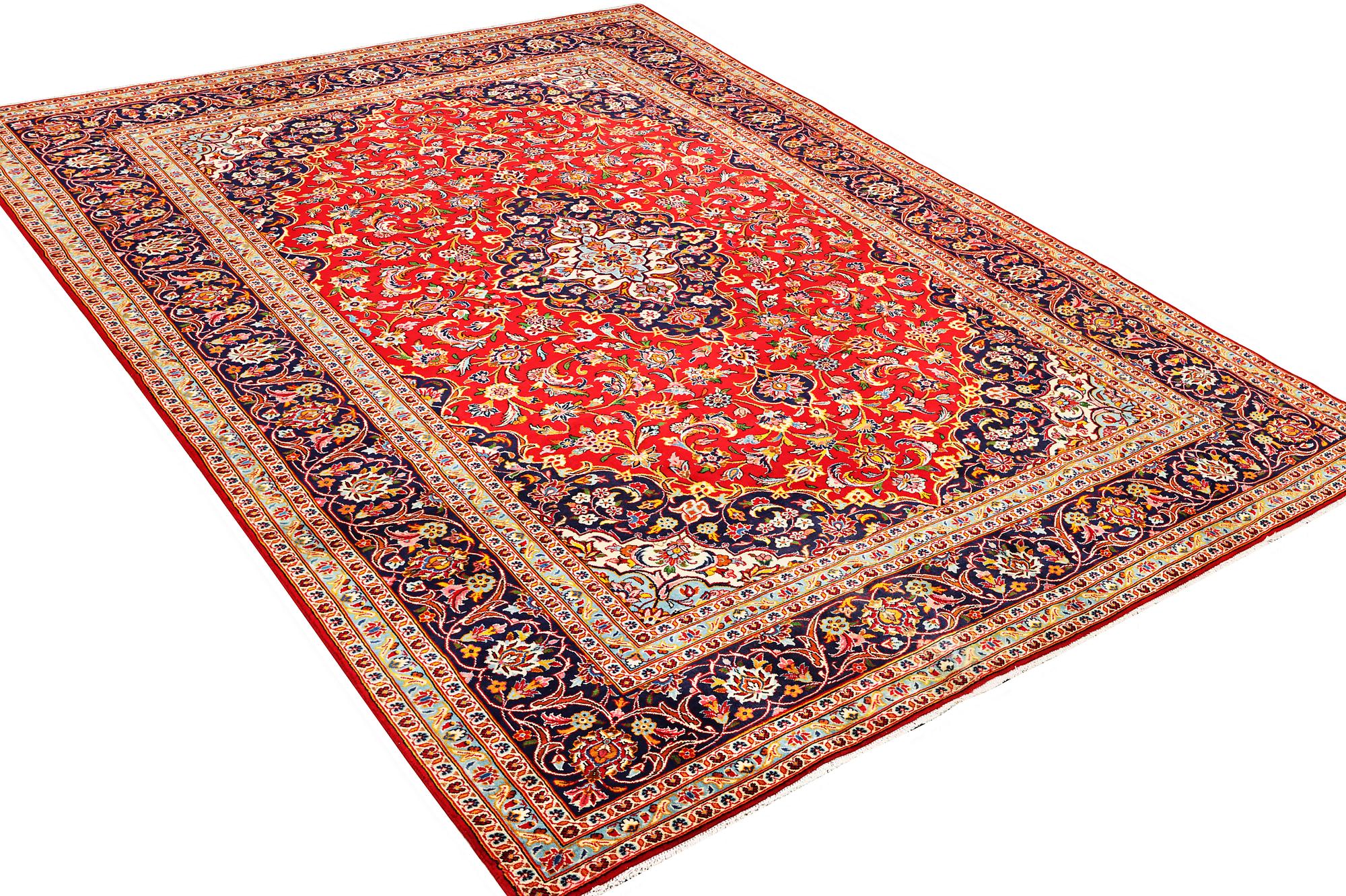 A Kashan carpet, a. 360 x 243 cm.