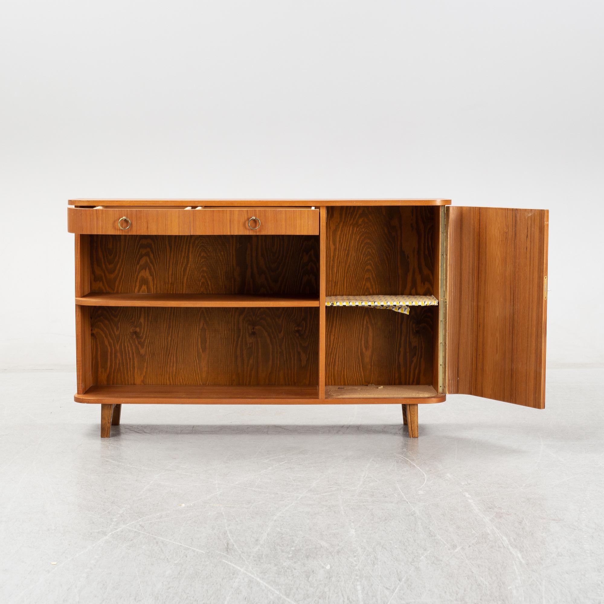A teak book case. Second half of the 20th Century.