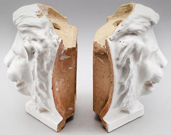 DEKORELEMENT, 2 st, till kakelugn, 1900-talets första hälft.