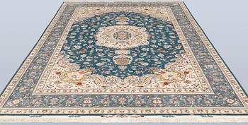 A part silk Tabriz carpet, so-called 50 Raj, approx. 306 x 200 cm.