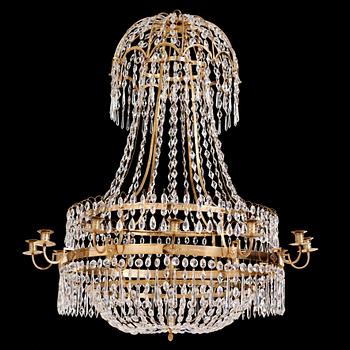 105. A late Gustavian gilt brass and cut glass thirteen-light chandelier, circa 1800.