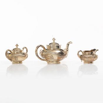 A three-piece Chinese silver tea service, Shanghai, early 20th Century.