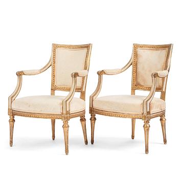 A pair of late Gustavian open armchairs by J. E. Höglander (master in Stockholm 1777-1813).