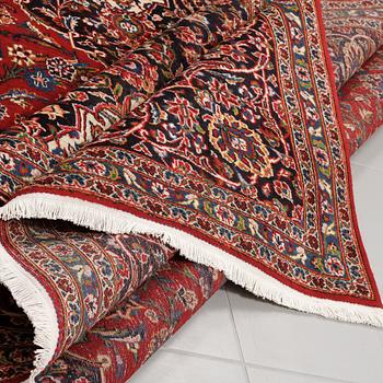 A Keshan rug, 397 x 298 cm.