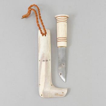 A Sami knife, reindeer horn, signed AS and dated -87.