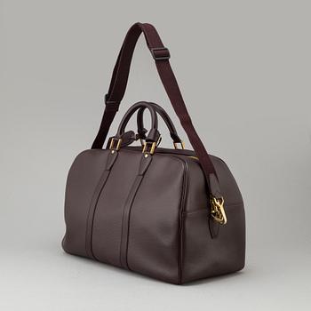 LOUIS VUITTON 'Taïga Kendall PM' bag.