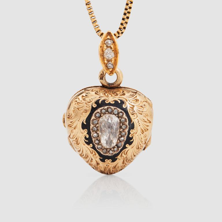 A Victorian pendant, set with a rose-cut diamond and black enamel.