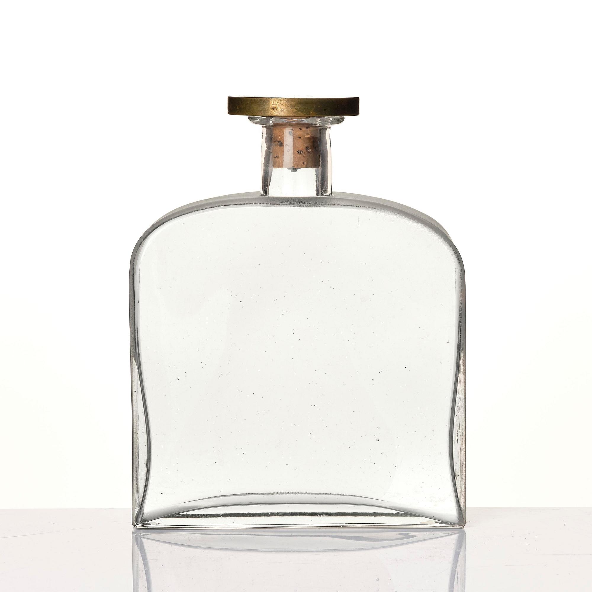 Firma Svenskt Tenn, a glass bottle model A 1608, with a pewter and brass stopper by Björn Trägårdh, Stockholm, 1930s.