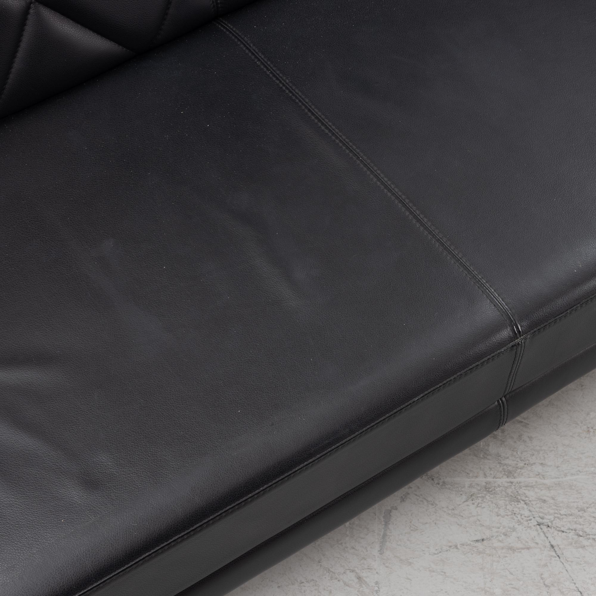 A leather upholstered sofa, 21st Century.