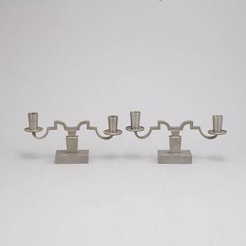 Nils Fougstedt, A pair of pewter candle sticks for Firma Svenskt Tenn, 1933.